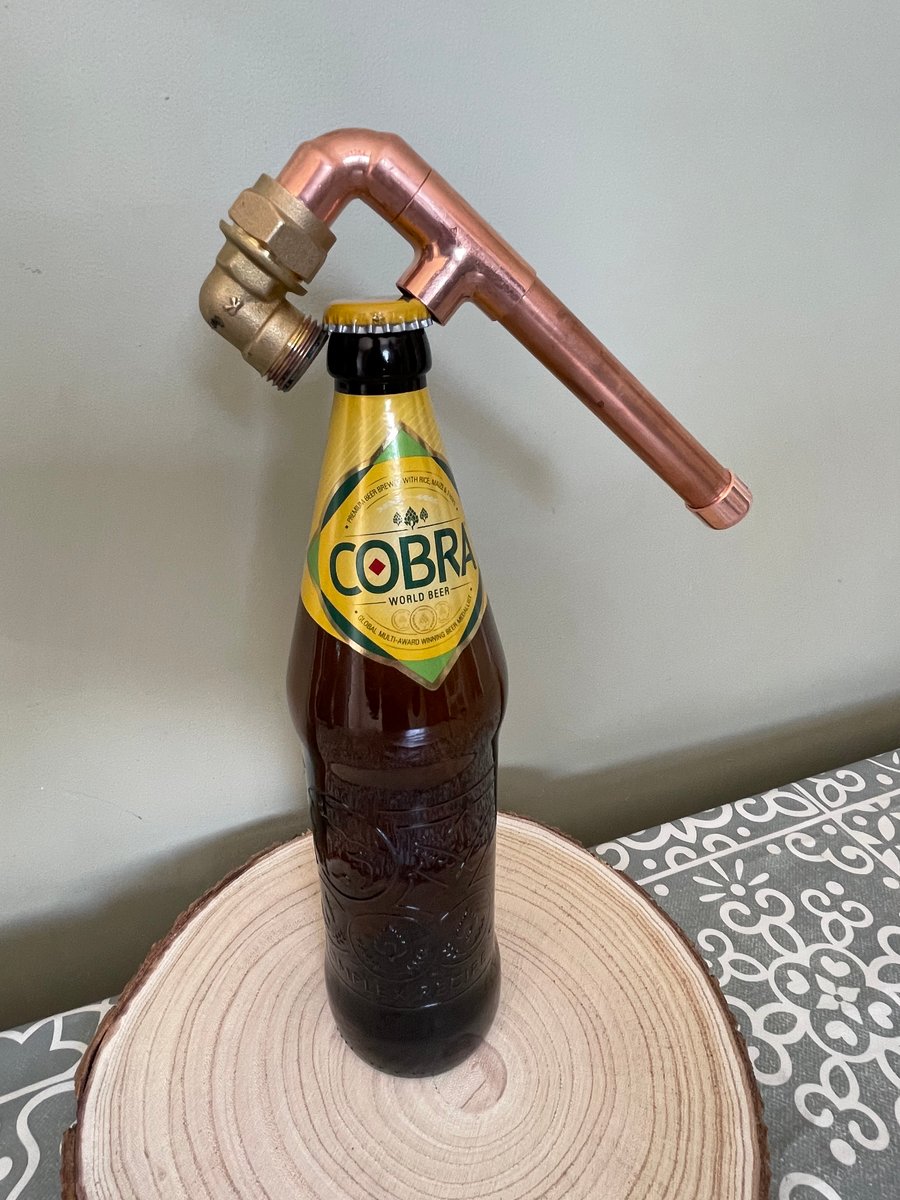 Copper pipe bottle opener