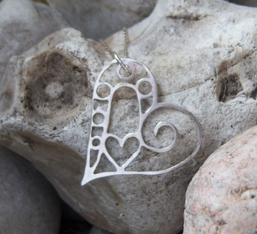 Filigree heart pendant in sterling silver