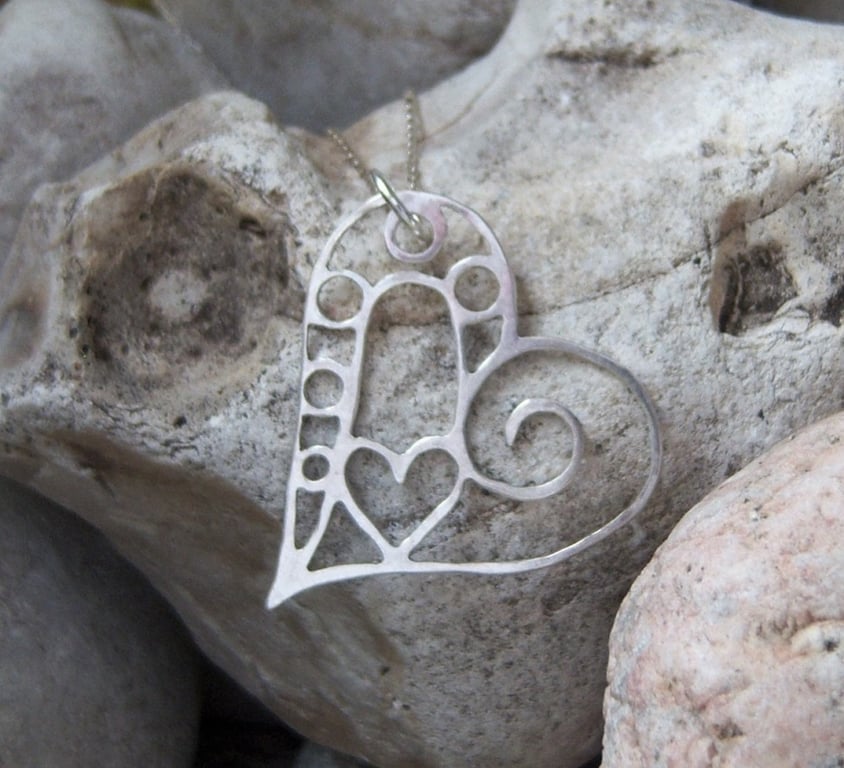 Filigree heart pendant in sterling silver