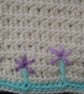Crochet Baby jumper in cream with mauve embroidered flowers 22 in chest.  - Image 4