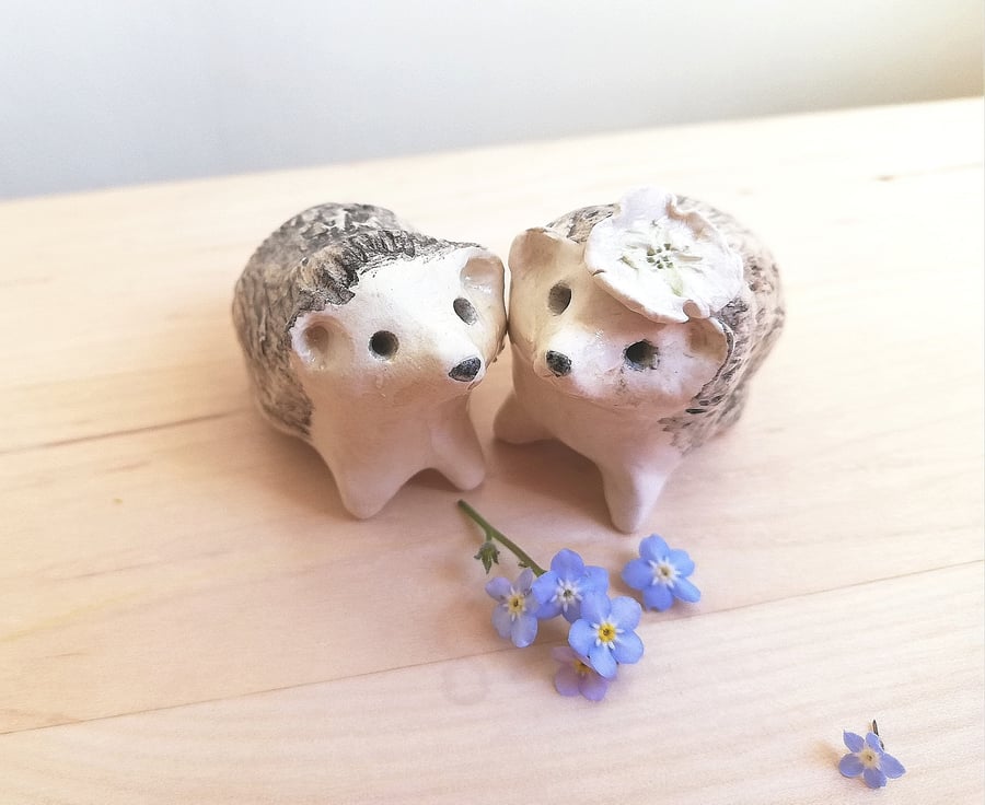 Hedgehog bride and groom wedding cake toppers. Ceramic handmade hedgehog totem