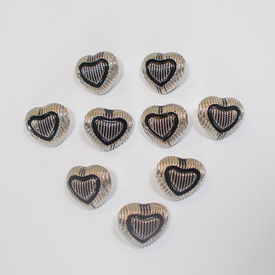 Gunmetal and black heart shaped shank buttons. 22mm approximately  Pack of 9