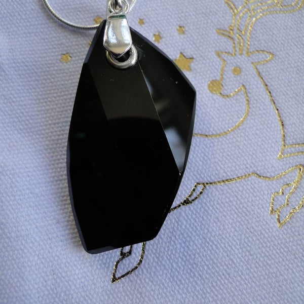 Eye-catching Black crystal pendant with sterling silver bail and chain  
