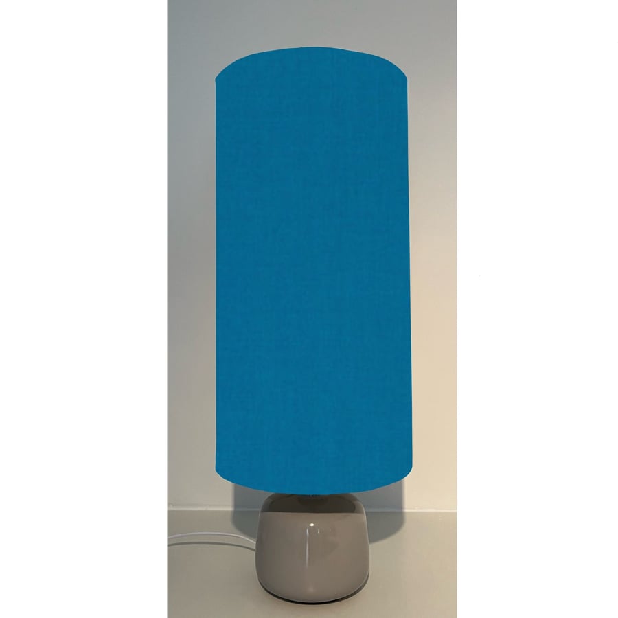 Teal blue cotton drum extra tall cylindrical lampshade, with a white lining