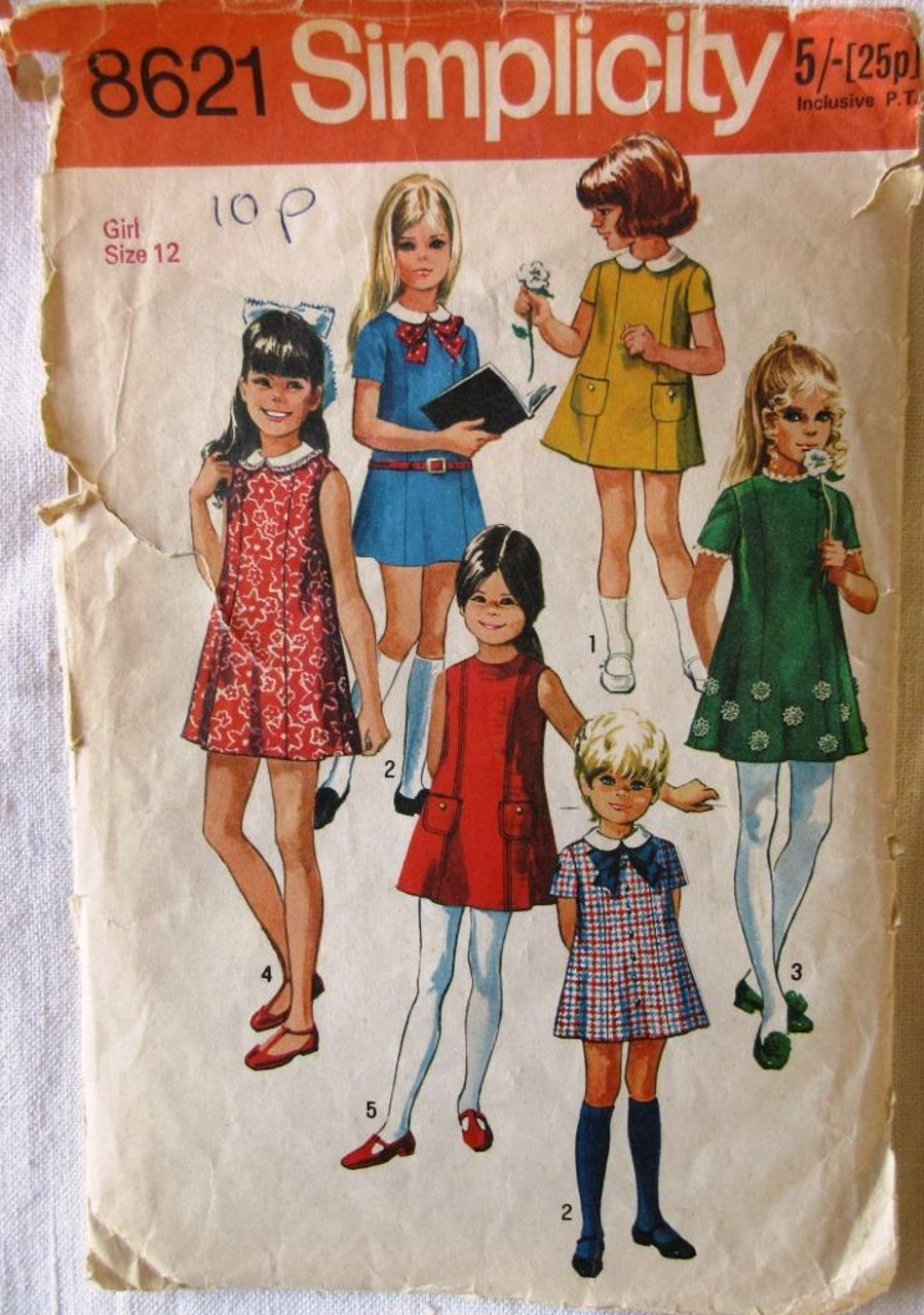 A vintage sewing pattern for a girl's dress in size 12 (Simplicity 8621)