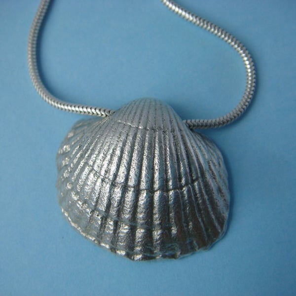 Cockle shell pendant, fine silver, with satin finish on a sterling silver snake 