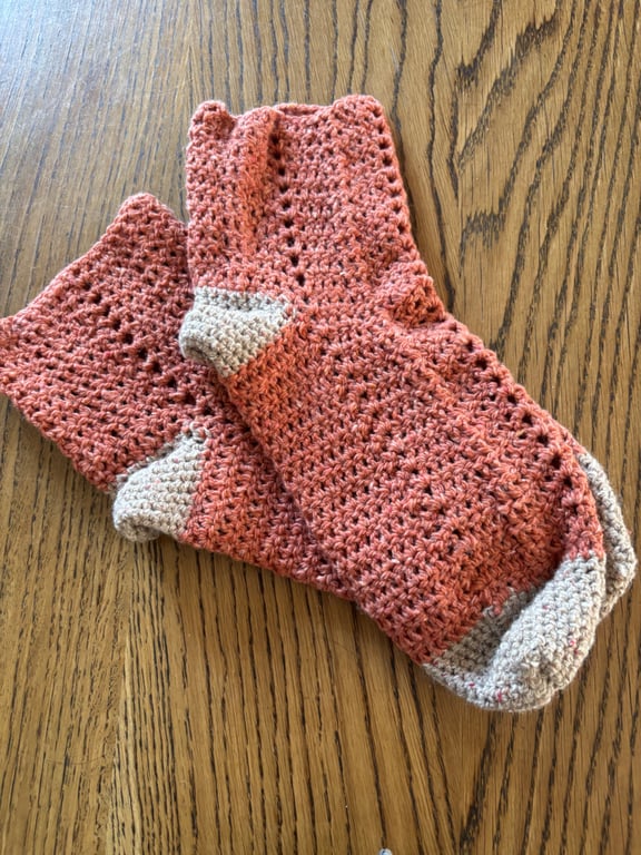 Pair of orange and beige crochet socks size 7-8 
