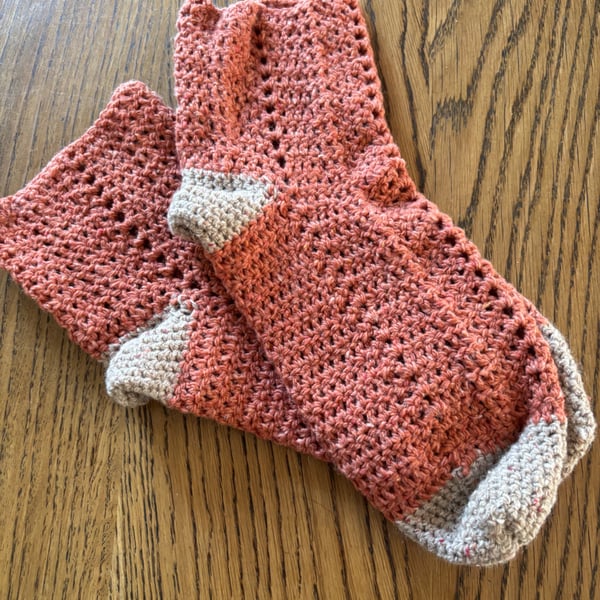 Pair of orange and beige crochet socks size 7-8 