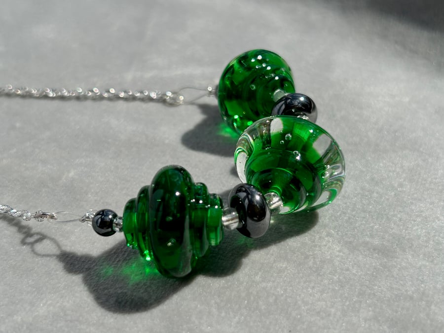 dark green lampwork glass beaded necklace