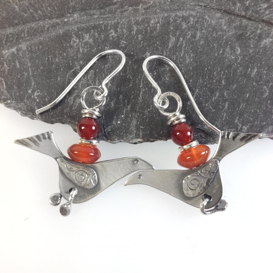 silver bird earrings with juicy orange carnelian.