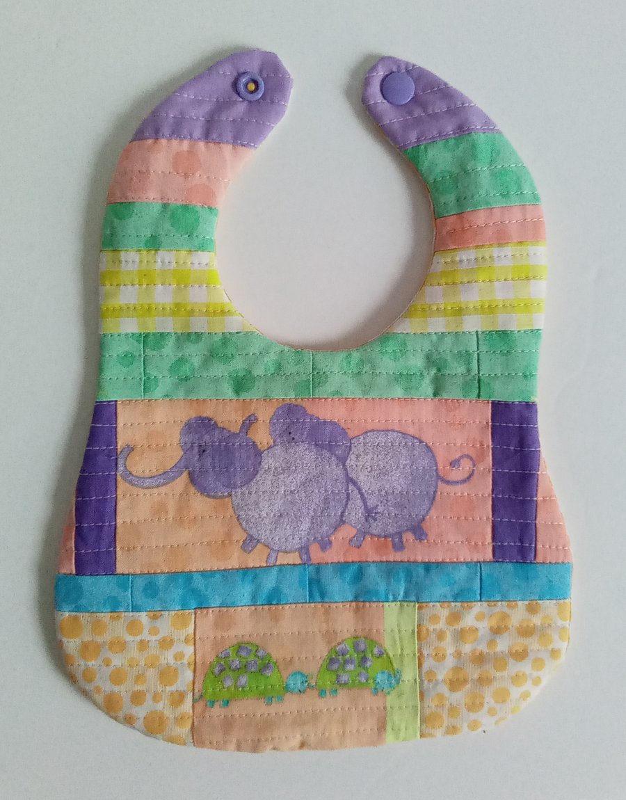 Gender neutral Patchwork and quilted reversible bib with Elephants for newborn 