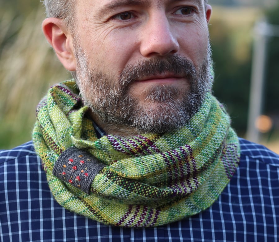 Unisex cowl woven in greens and purple hand dyed yarn with mushroom embroidery