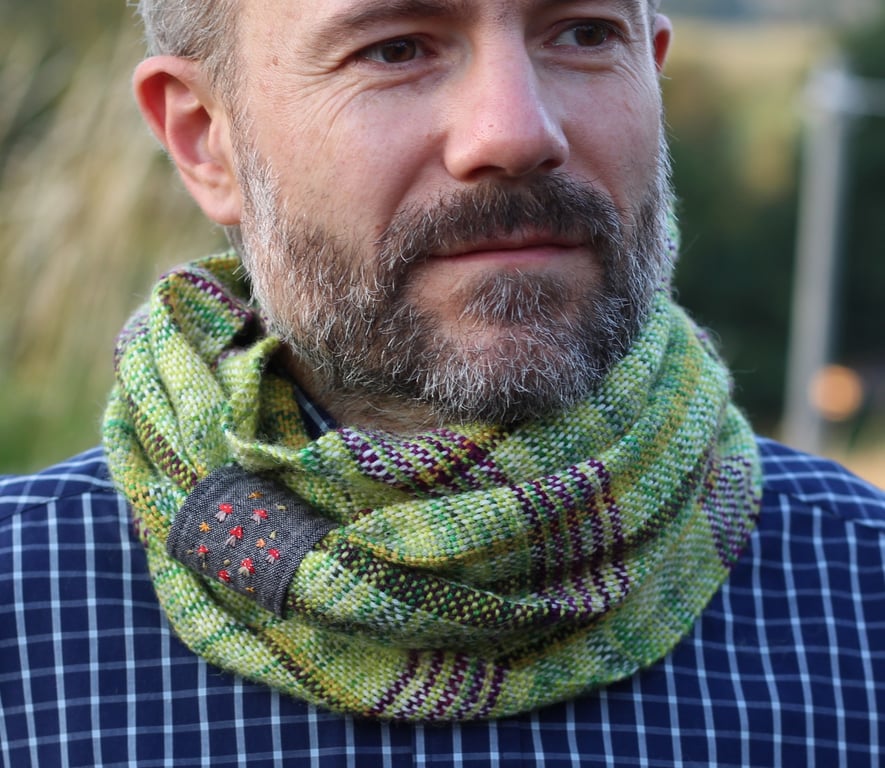 Unisex cowl woven in greens and purple hand dyed yarn with mushroom embroidery