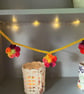 Crochet Garland of Small Bright Multicolour Flowers - Image 4