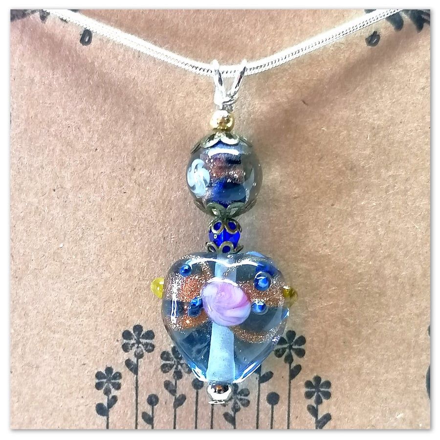 Necklace Light blue Murano glass heart on a silver plated chain
