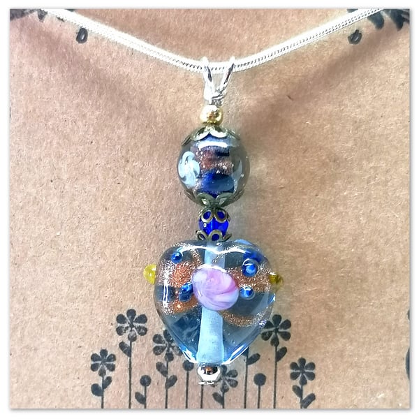 Necklace Light blue Murano glass heart on a silver plated chain