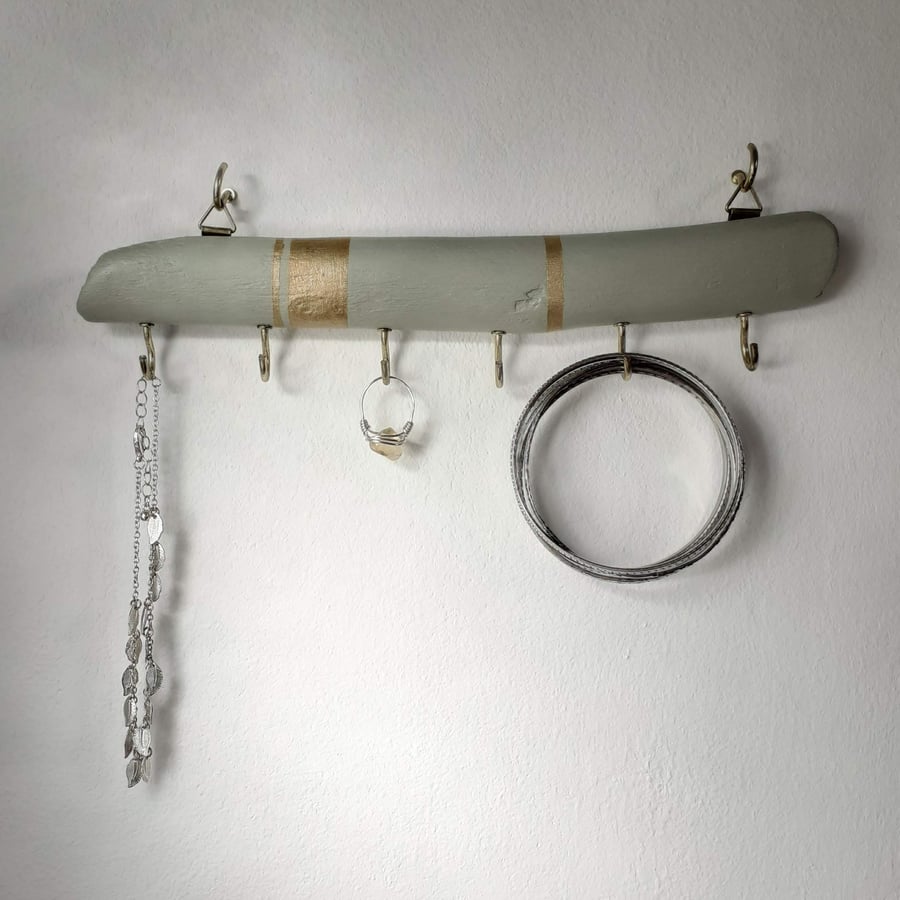 Pale green and gold wooden jewellery hanger
