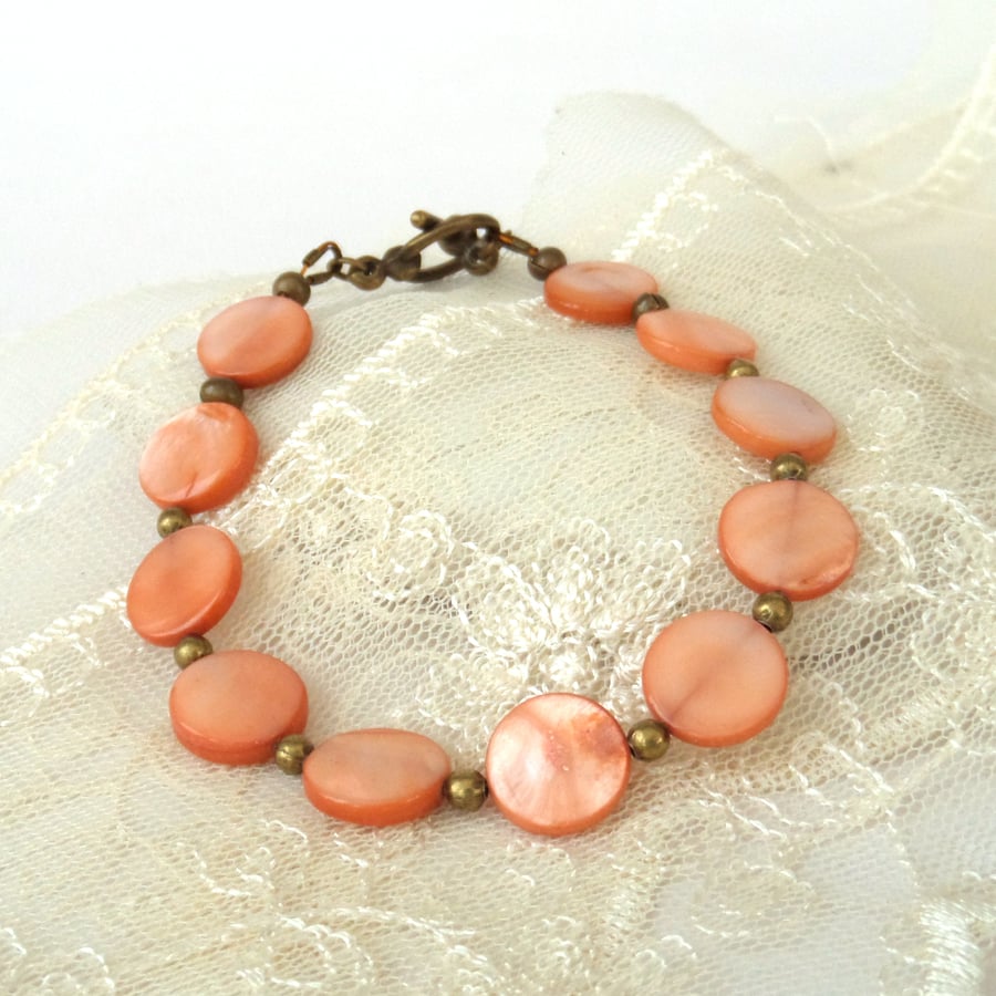 Peach shell coin bracelet