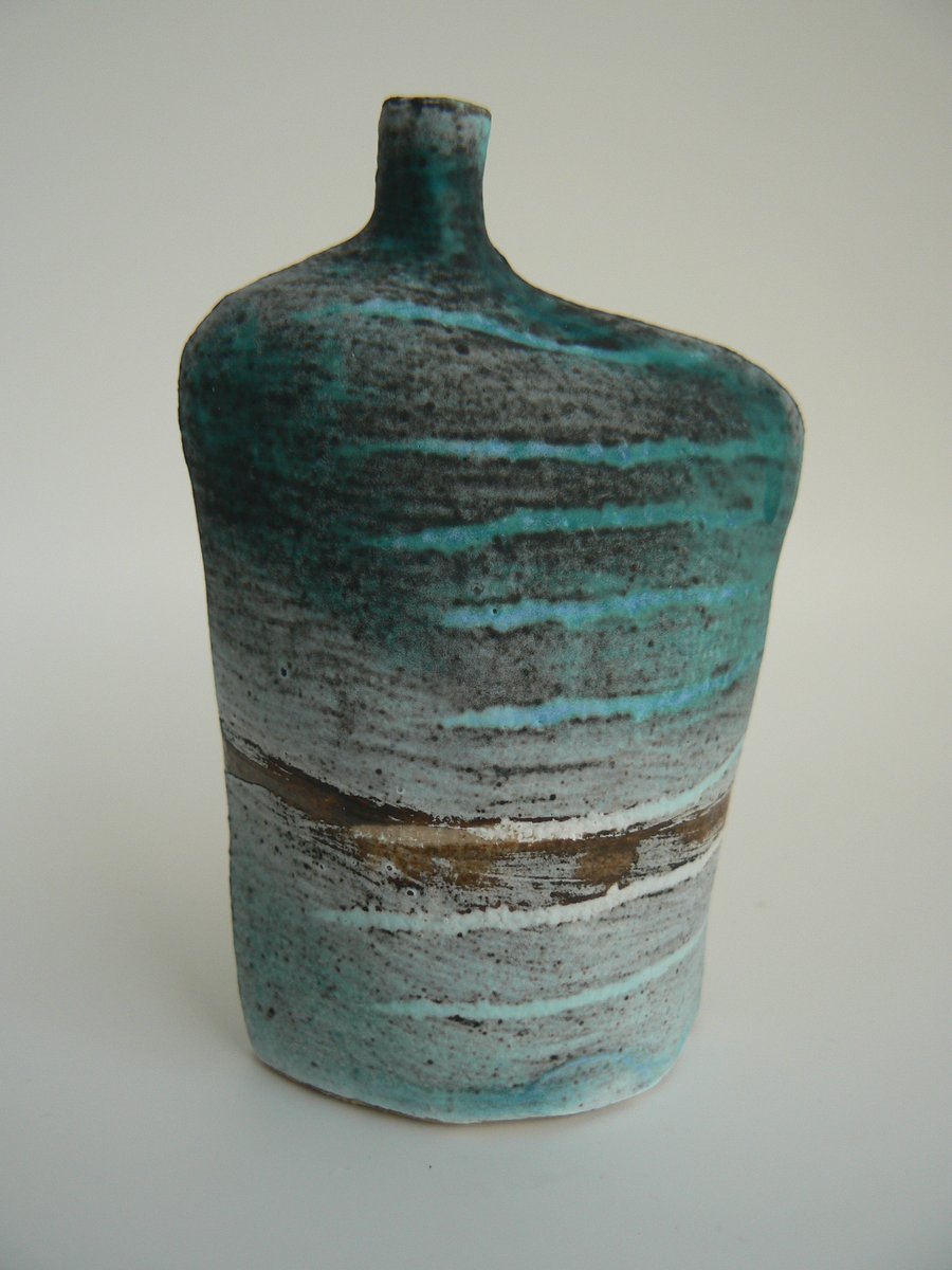 Tracks Bottle Slip Decorated onto Stoneware Ceramic