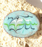 enamel brooch - scrolled blue, green, white over turquoise - Image 2