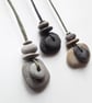 Layered Pebble Pendant with Metal Bead - Image 2