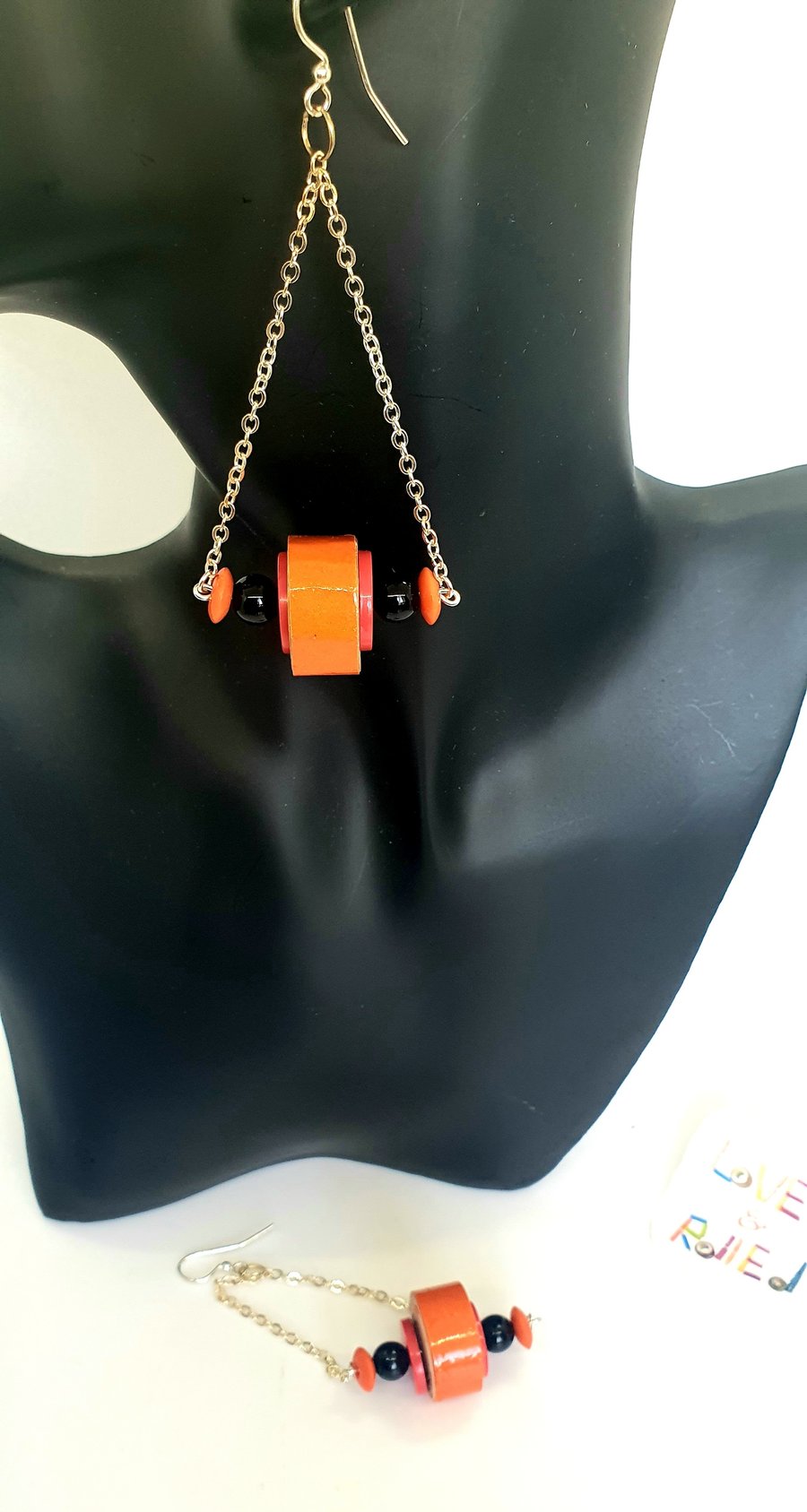 Vibrant dangling orange paper beaded earrings 