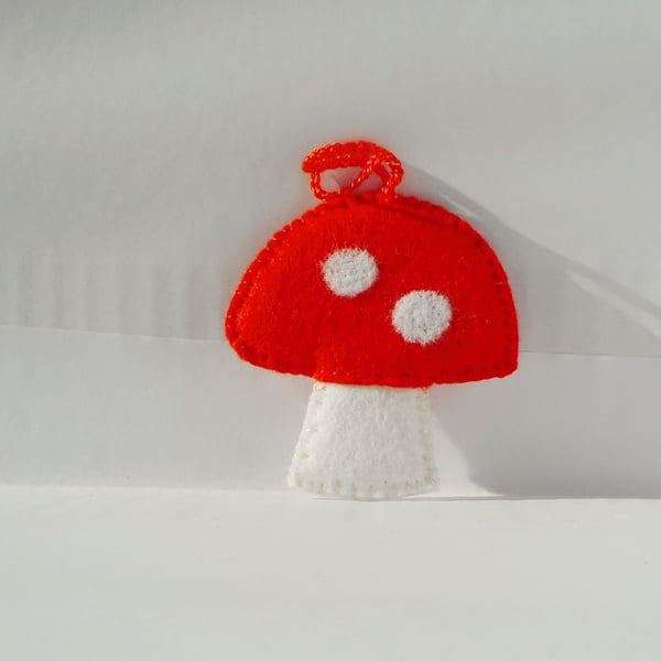 Orange toadstool hanging decoration, needlefelted 