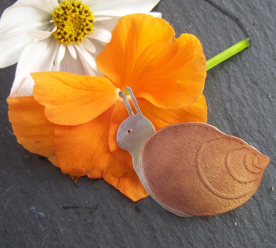 Snail brooch in copper and sterling silver