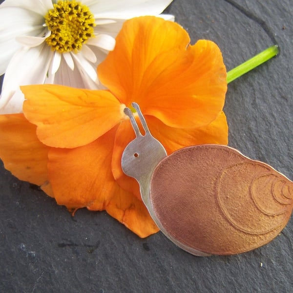 Snail brooch in copper and sterling silver