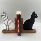 Black and white cat book ends