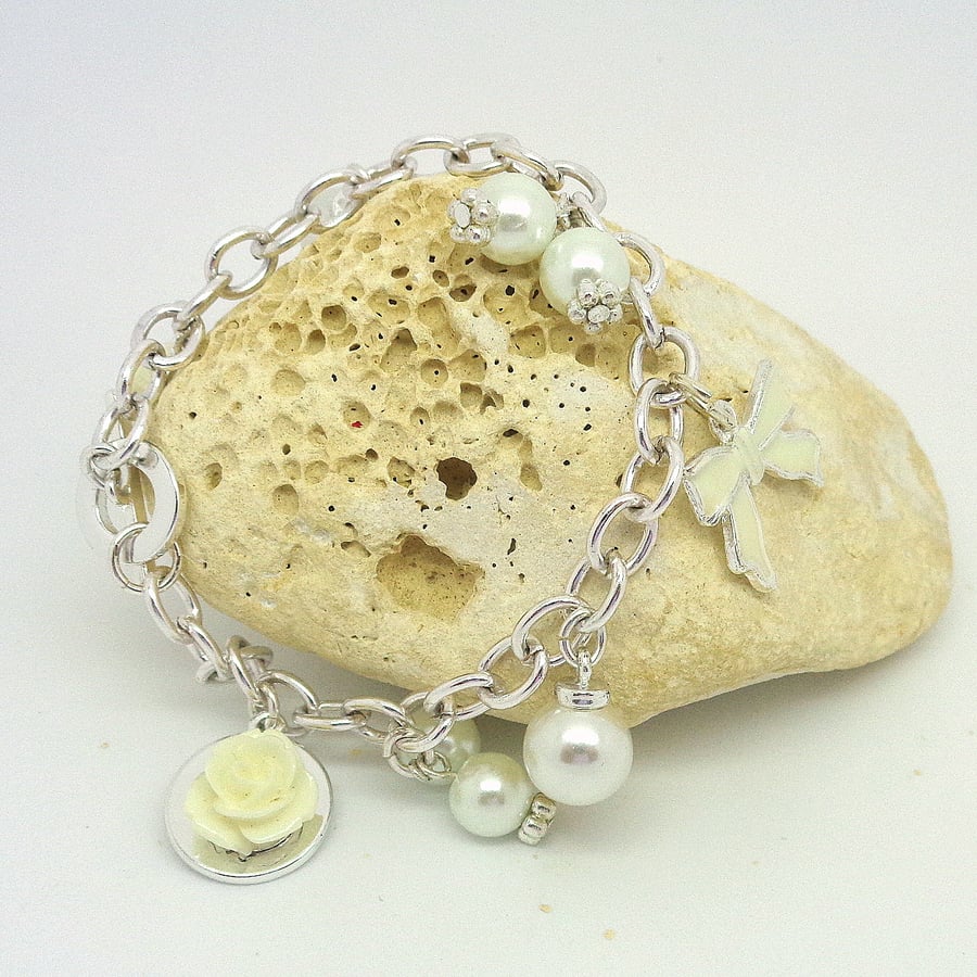 Charm bracelet white pearls and white roses winter theme