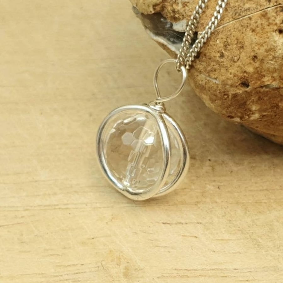 Small clear quartz circle pendant necklace. April Birthstone