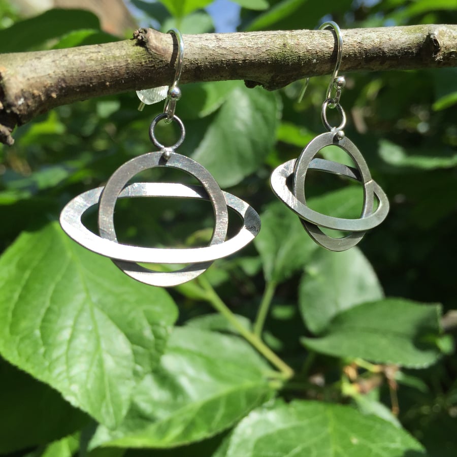 Silver Saturn earrings