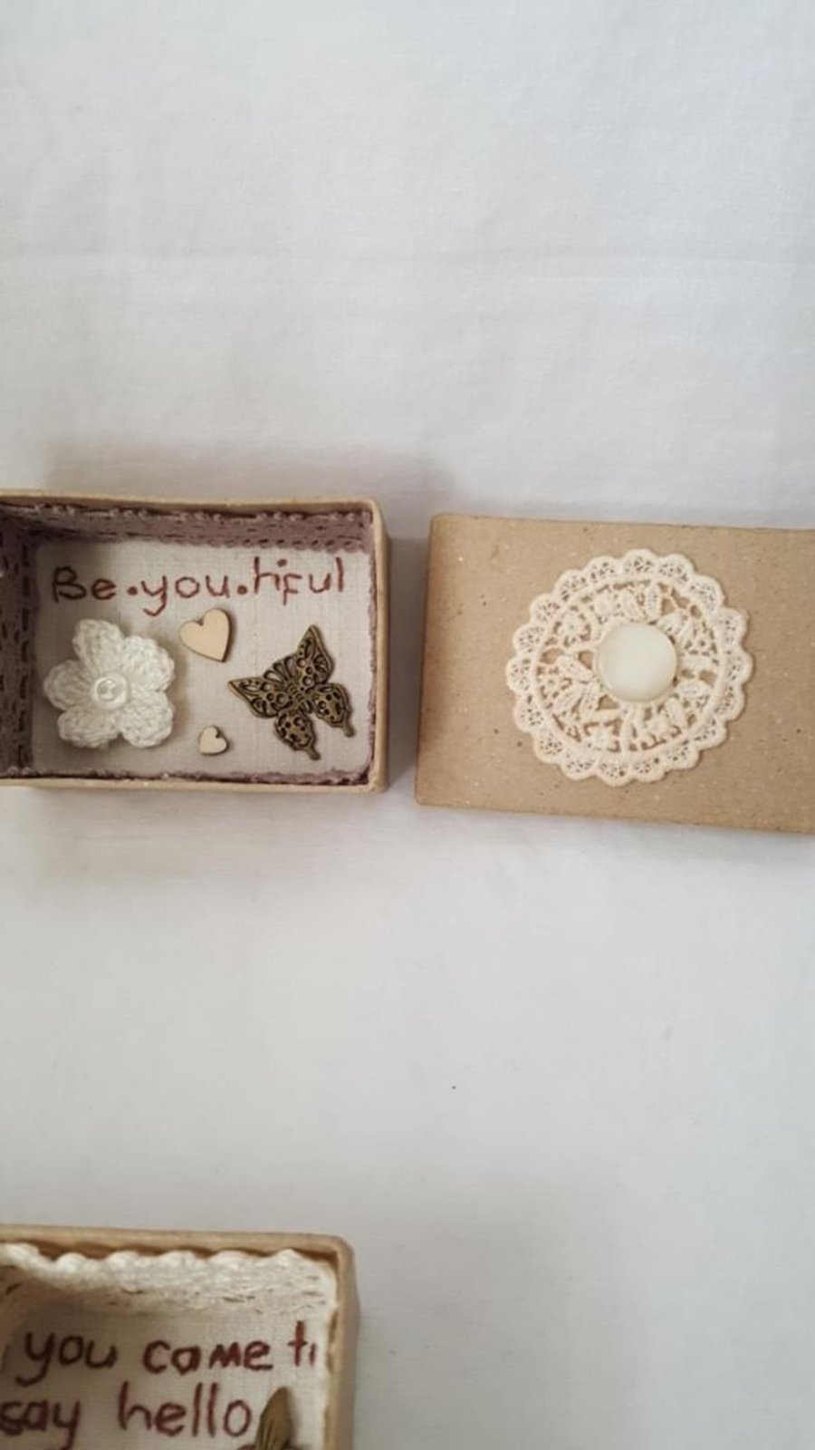 small miniature art diorama with a message 'be-you-tiful'