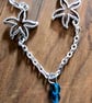Starfish charm anklet with blue glass bead accents