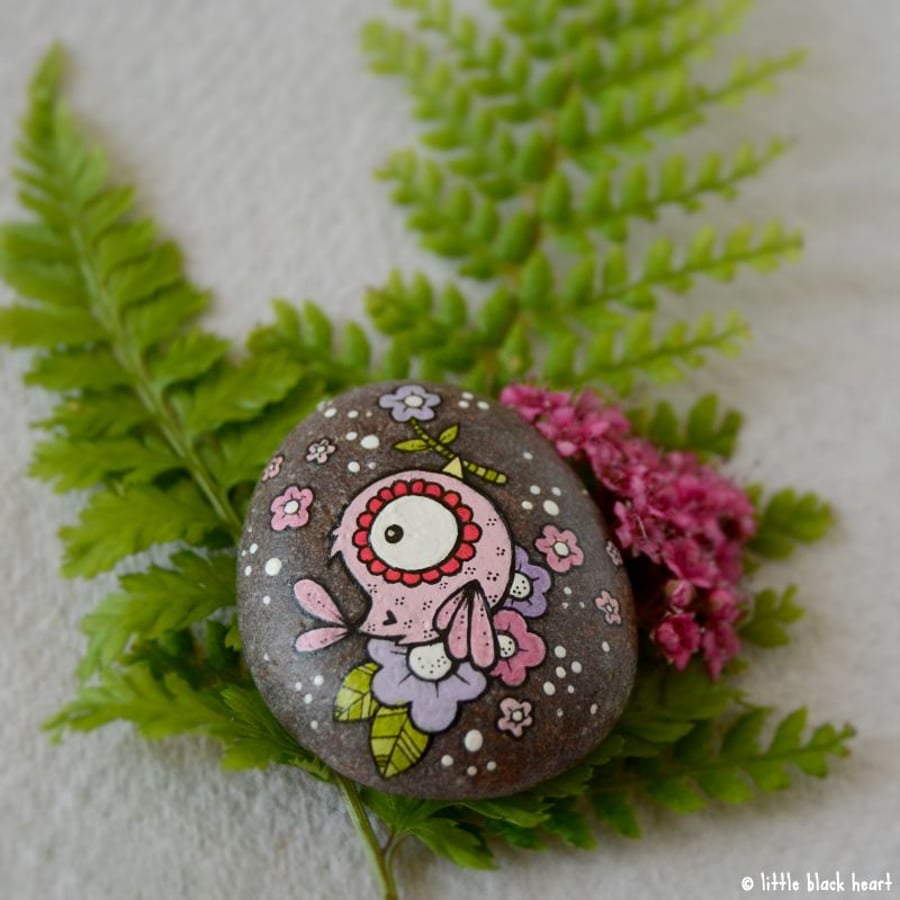 painted pebble - pink bird and blossom