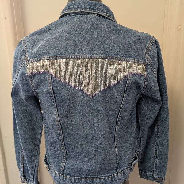 Up-cycled denim jacket with beaded fringe. Size 12.