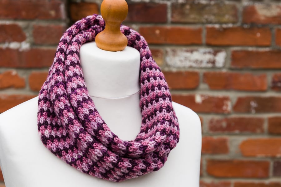 Warm winter cowl handknit in pink and purple shades of pure, soft merino wool