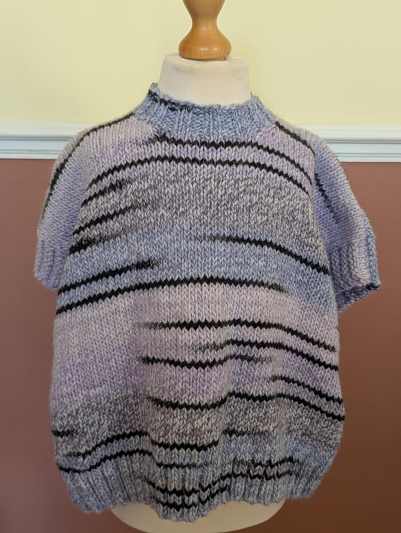 Hand knitted jumper poncho