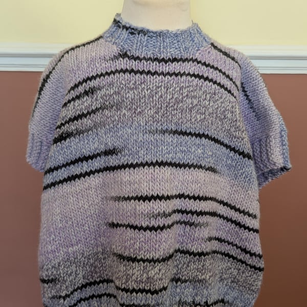 Hand knitted jumper poncho