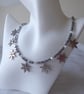 Cube and Faceted Bicone Beaded Necklace with Seven Dangling Metal Snowflakes  