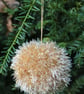 Hand Knitted Gold Tinsel Bauble - Image 1