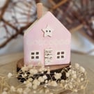 Lovely little pink wooden house
