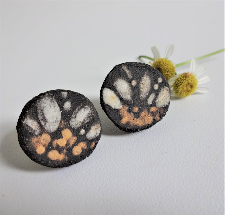 Handmade black ceramic earrings with flowery motif