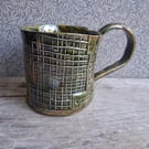 Olive green abstract check coffee cup, geometric rustic tea mug