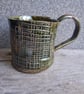 Olive green abstract check coffee cup, geometric rustic tea mug
