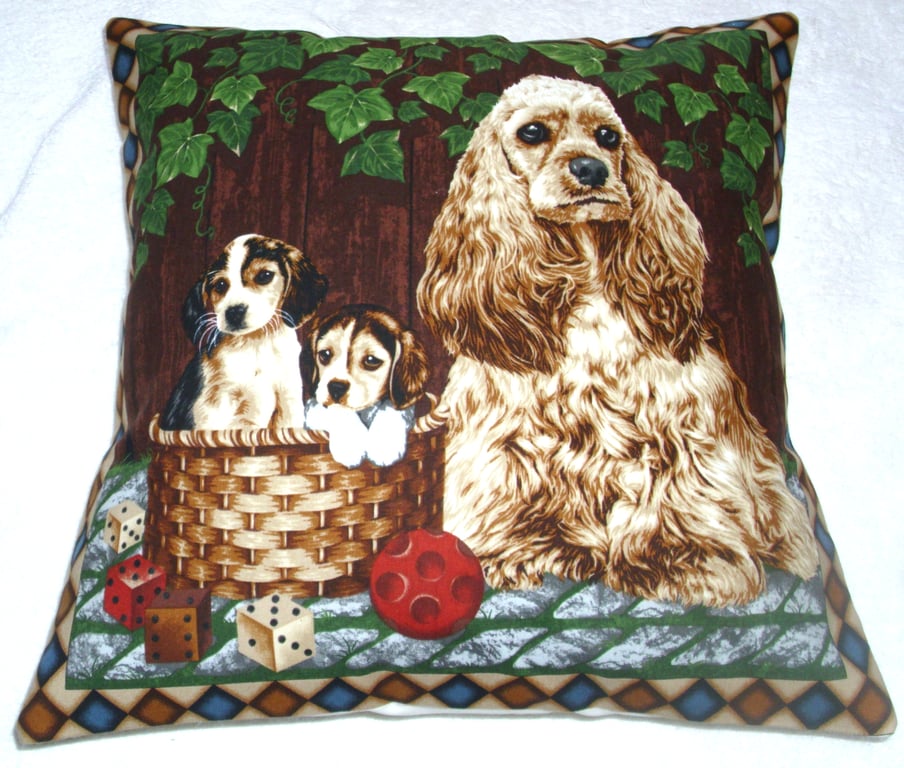 Dogs cushion with an American Cocker Spaniel  and pups in a garden.