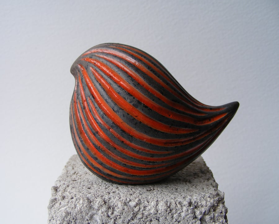 Round bird, carved raku fired, orange