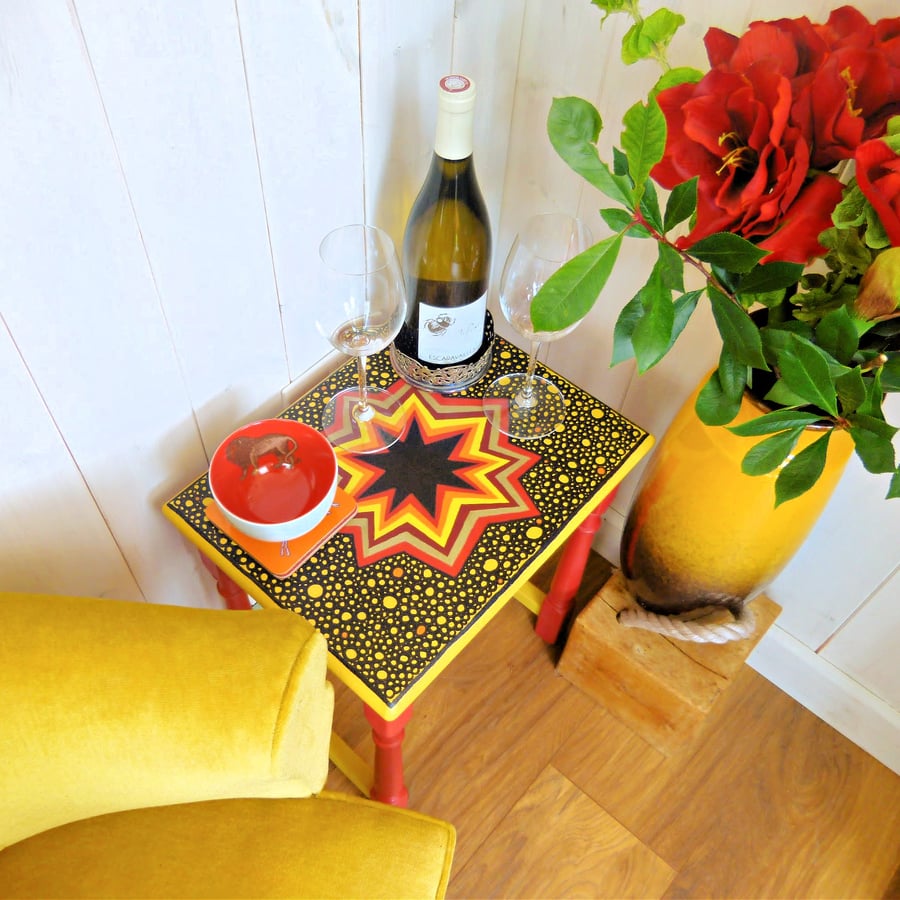Hand painted yellow and red artsy Star table