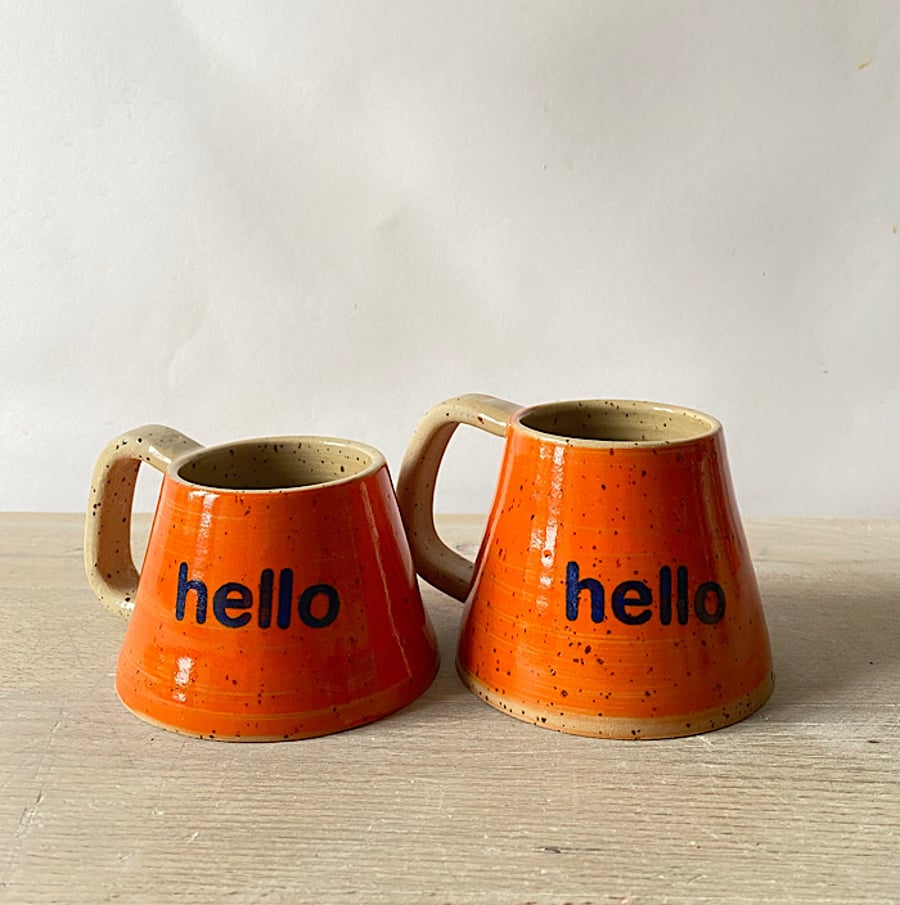 Set of 2 Hello speckled clay cups.
